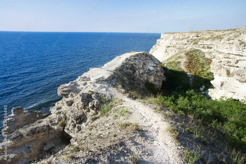 Black sea and high rock cliff on a western coast of Crimea.
