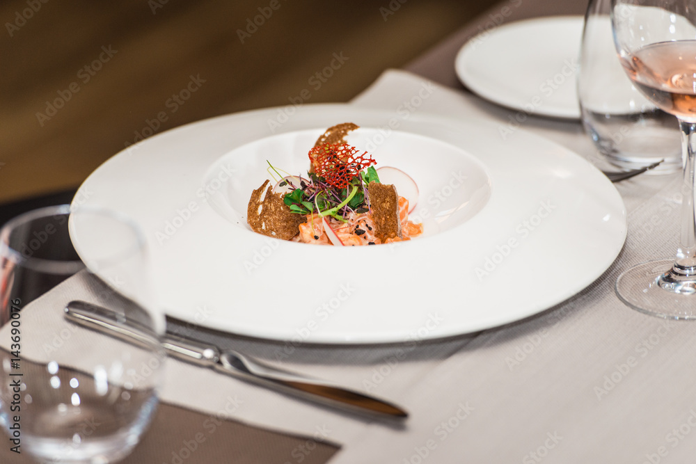 delicious salmon in a restaurant. small portion delicious salmon in a restaurant. small portion