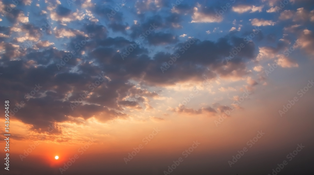 The Dramatic Moment of Sunset Sky and Clouds.