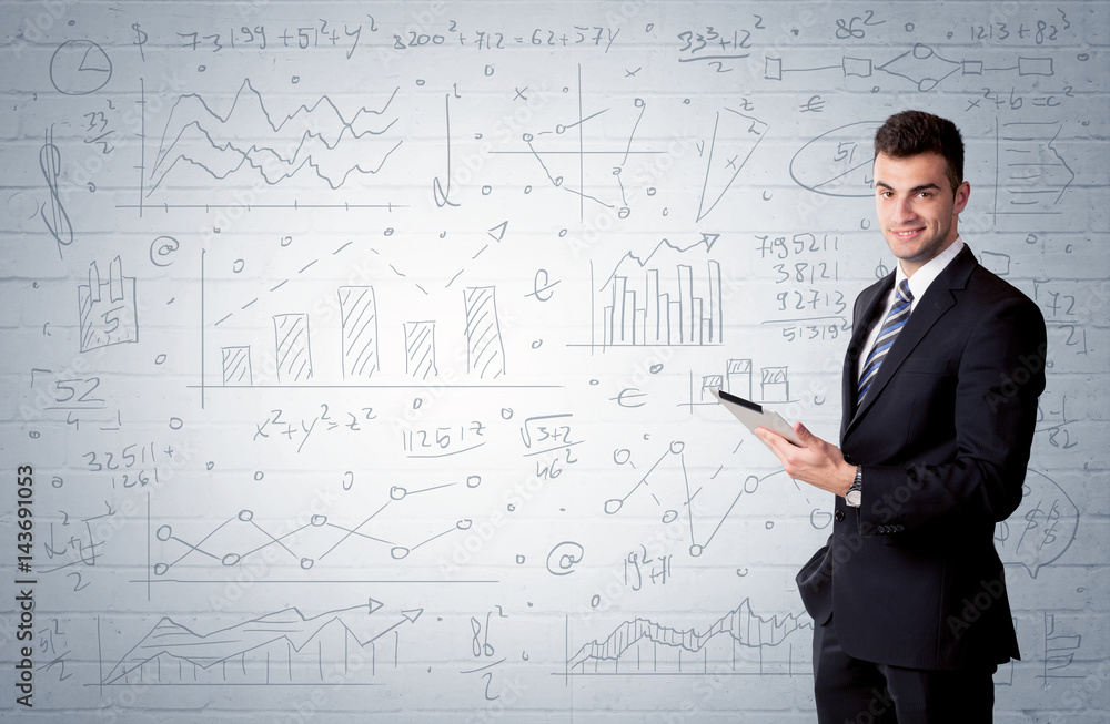 Salesman standing with drawn graph charts Salesman standing with drawn graph charts