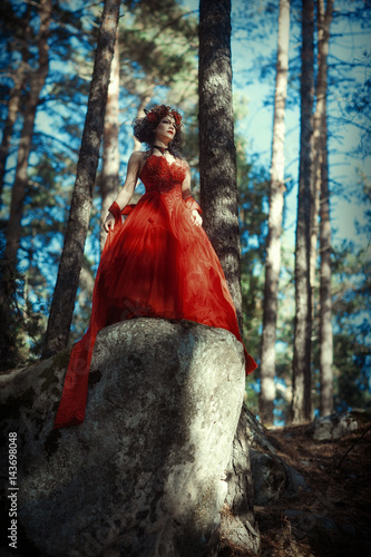 Fairy-tale image of a girl in the forest