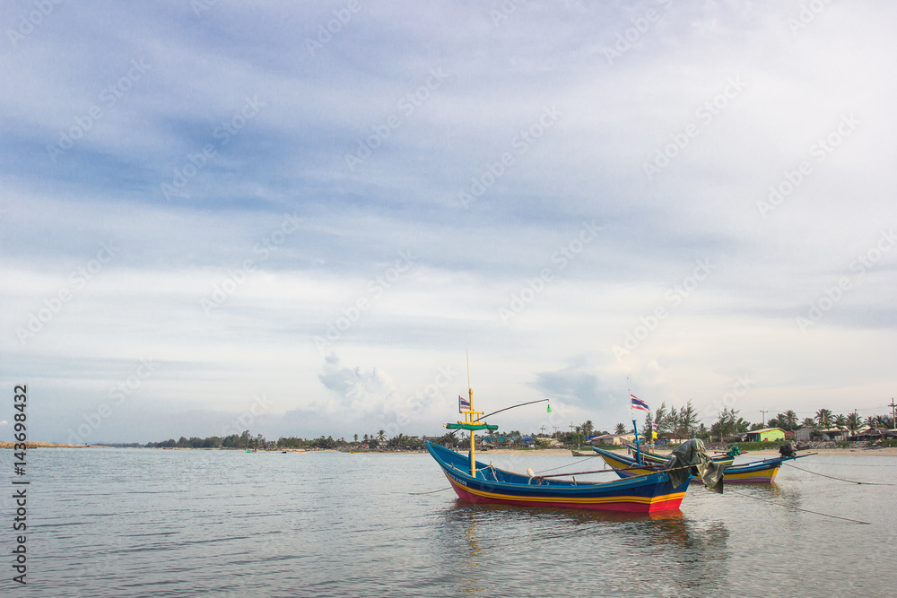 Thai fishing boats with blue sky