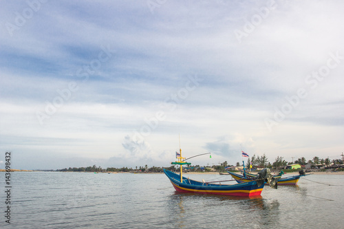 Thai fishing boats with blue sky