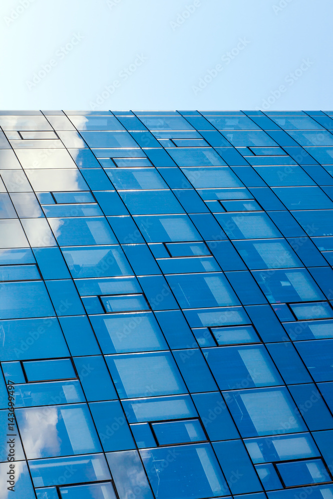 Modern office building, with a clean view of the sky. Economic and financial concept. Facade glass building background and sky view. Modern office building, with a clean view of the sky. Economic and financial concept. Facade glass building background and sky view.
