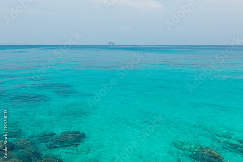 Fototapeta Naklejka Na Ścianę i Meble -  Phuket thailand andaman sea surface summer wave background. Maiton island