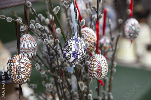 colorful decorative eastereggs on willow photo