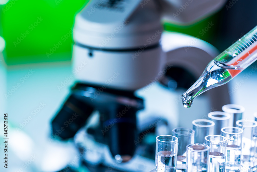 Science laboratory research and development concept. microscope with test tubes Science laboratory research and development concept. microscope with test tubes