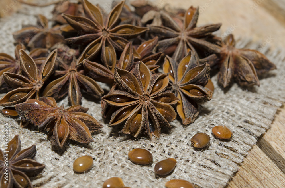 Close-up of anise on rustic background Close-up of anise on rustic background
