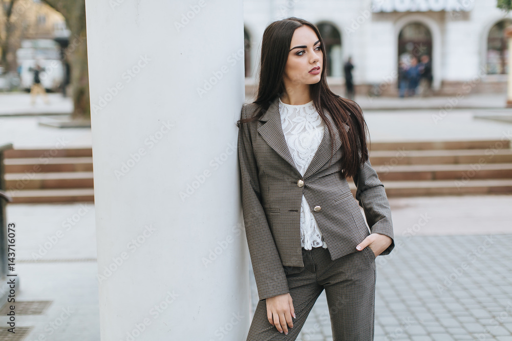 Portrait of business woman on the street.