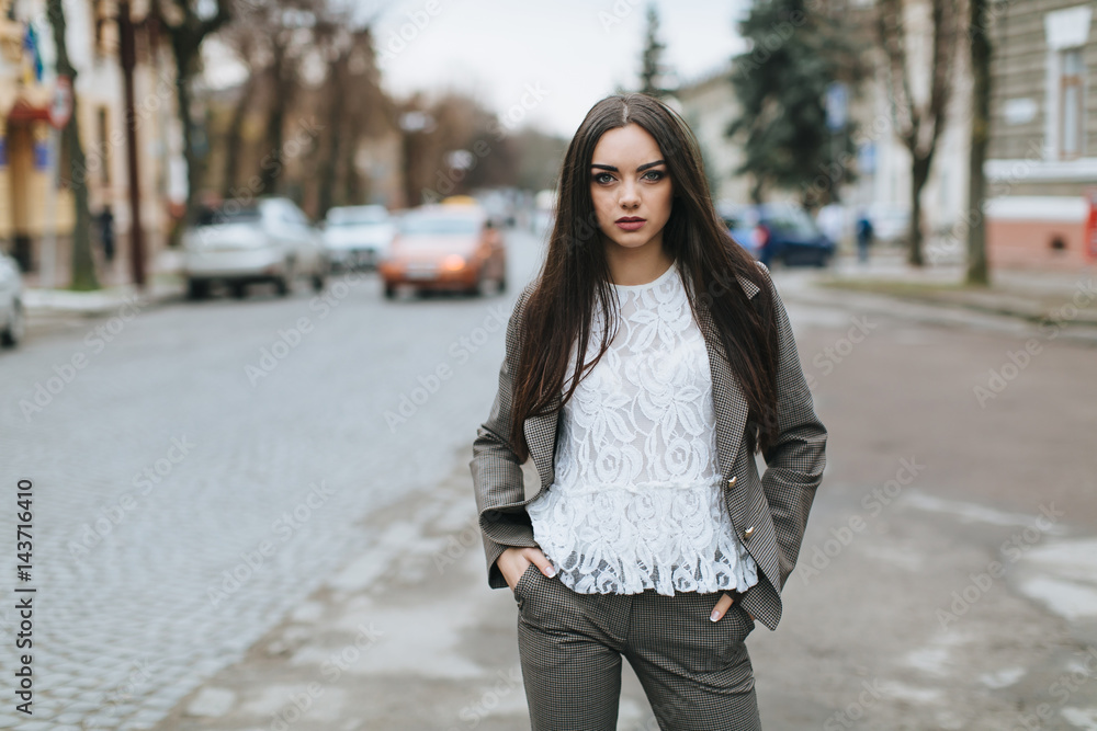 Business woman walking on a street. Business woman walking on a street.