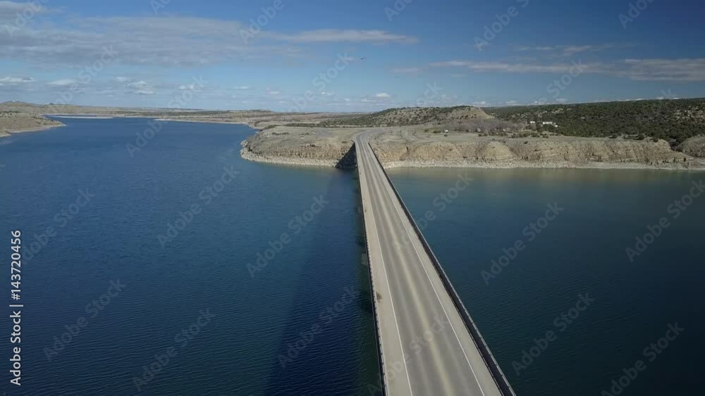 Aerial lake bridge Starvation Reservoir vehicle traffic Utah pt 2. State Park year round recreation, fishing and boating. Freedom Bridge. Aerial lake bridge Starvation Reservoir vehicle traffic Utah pt 2. State Park year round recreation, fishing and boating. Freedom Bridge.