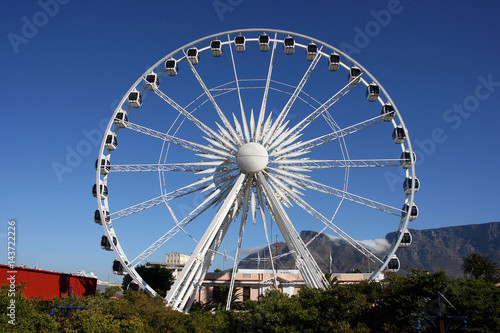 White ferris wheel at an entertainment theme park in the Cape Town Waterfront, South Africa