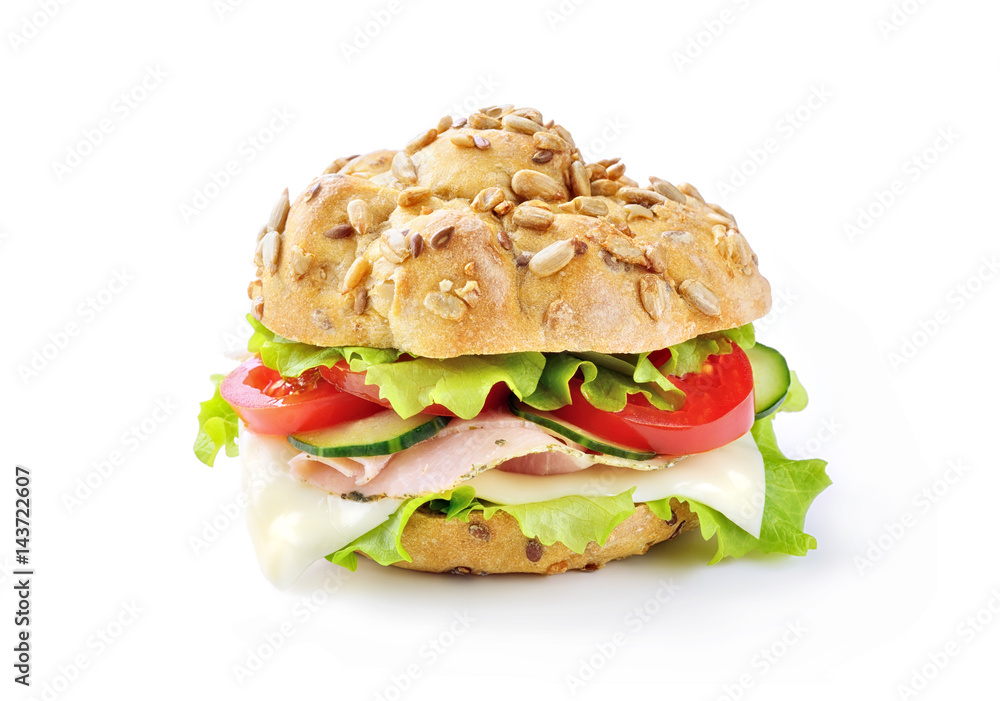 Sandwich with ham, cheese, lettuce, cucumber and tomato