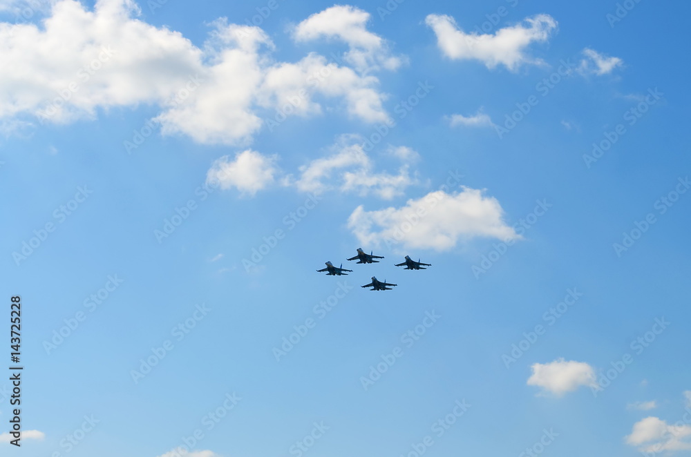 Flight of a aerobatic teams on military jet planes Flight of a aerobatic teams on military jet planes