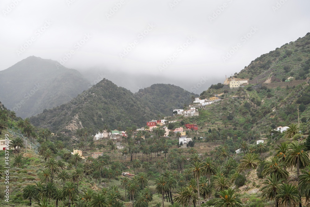 houses of La Gomera under the cloudscape