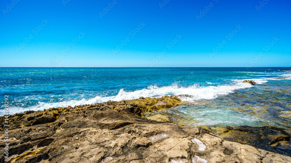 The rocky shoreline of the west coast of the island of Oahu at the resort area of Ko Olina in the island state of Hawaii in the Pacific Ocean