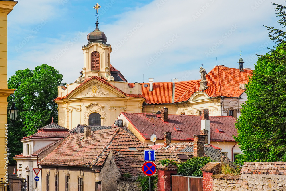 Church of the Most Sacred Heart of Our Lord and the Ursuline Convent behind the rooftops, Kutna Hora, Czech Republic