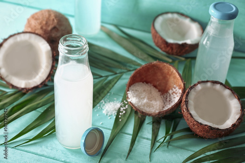 Beautiful composition with coconut water on table