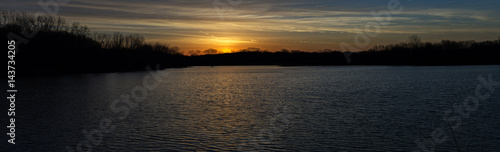 Sunrise over a lake near the Des Moines river
