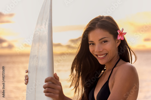 Sticker Beach sunset sexy surfer woman surfing lifestyle relaxing holding surfboard for surf