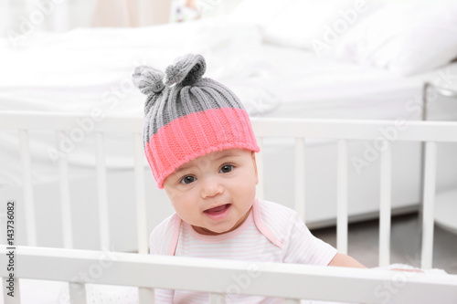 Cute little baby in cradle ...