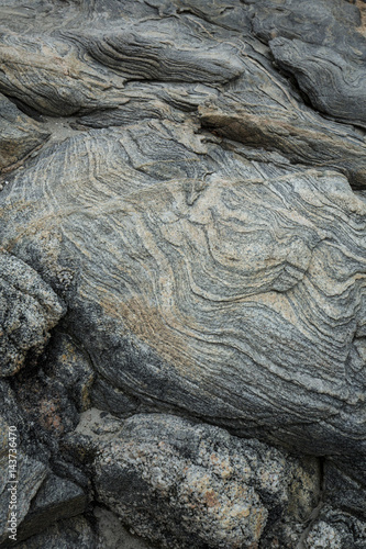 Swirling layers in gneiss bedrock of Harkness Park, Waterford, Connecticut.