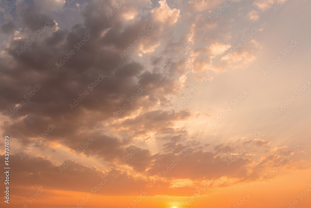 Colorful dramatic sky with cloud at sunset.Sky with sun background