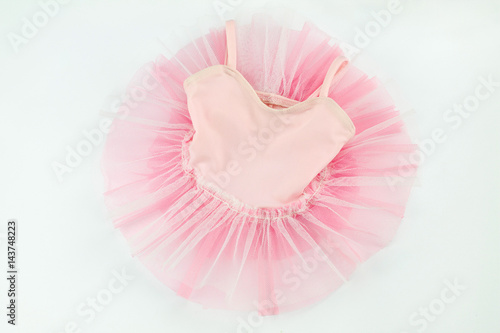 tender pink tutu for baby on white background photo