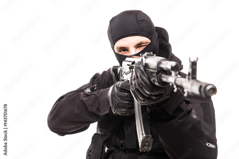 Modern soldier with rifle aim isolated on a white background