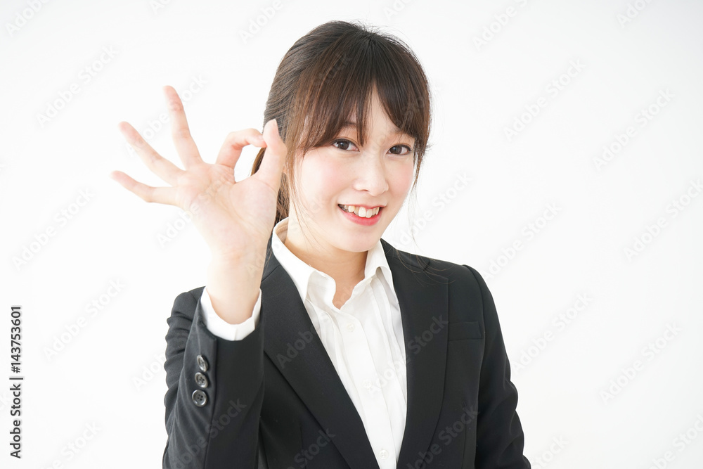 Young business woman showing OK gesture Young business woman showing OK gesture