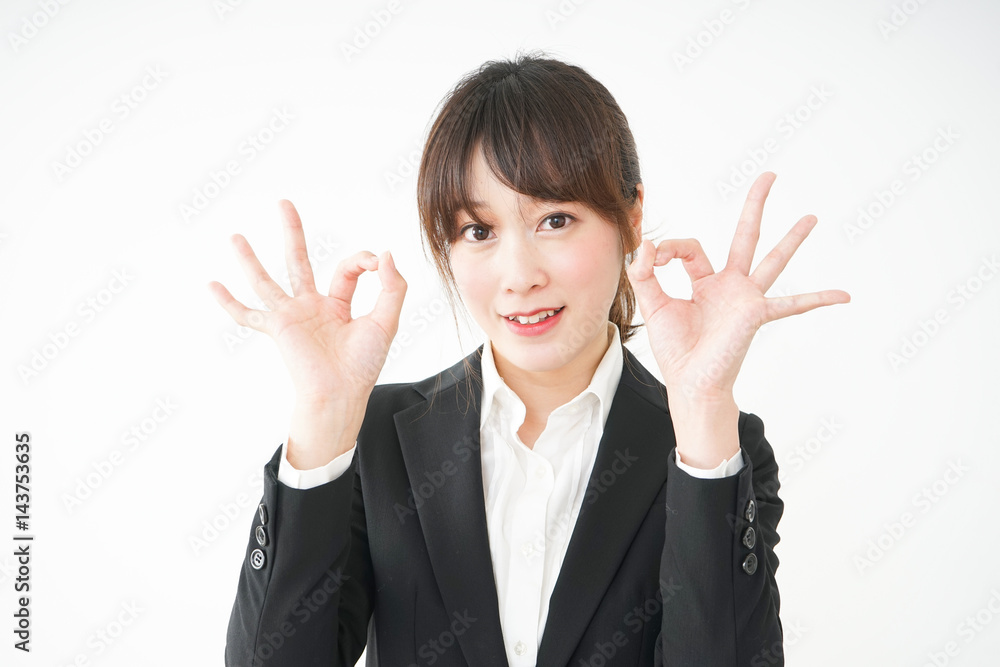 Young business woman showing OK gesture Young business woman showing OK gesture