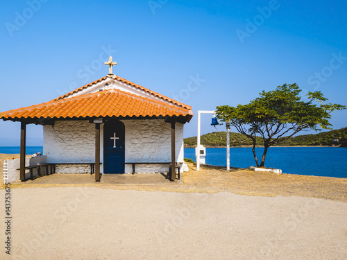 Traditional small white church with sea view in Cassandra peninsula,Greece. © Irina Demenkova