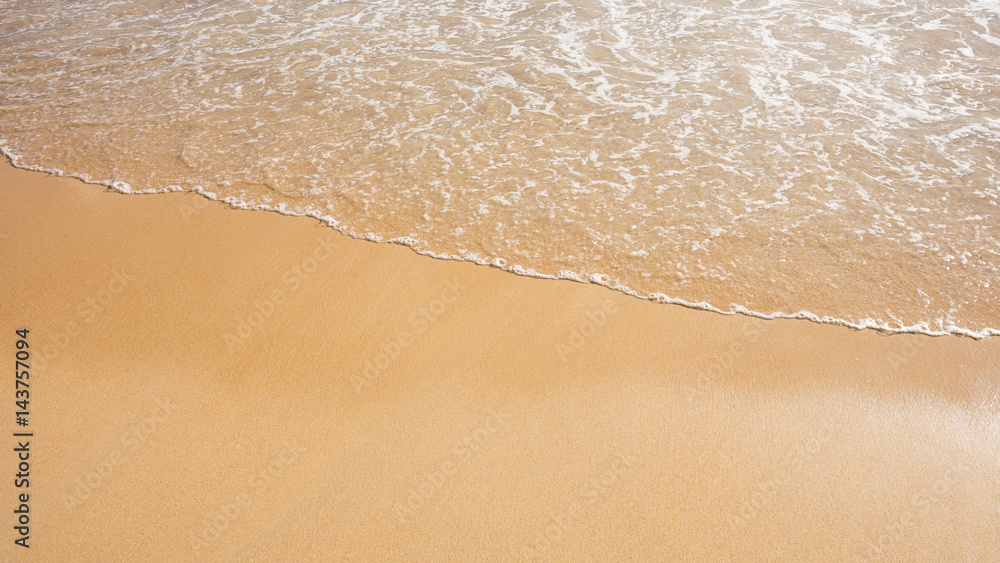Sand beach and wave.