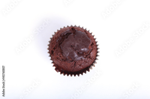 Fresh homemade muffins on white background. Top view.