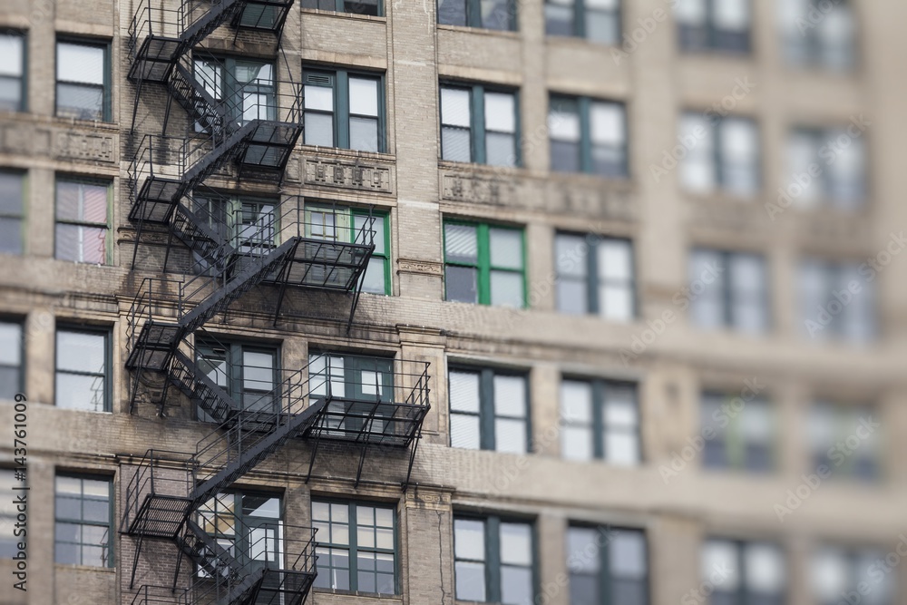 Metal fire escape outside apartment building for emergency Metal fire escape outside apartment building for emergency