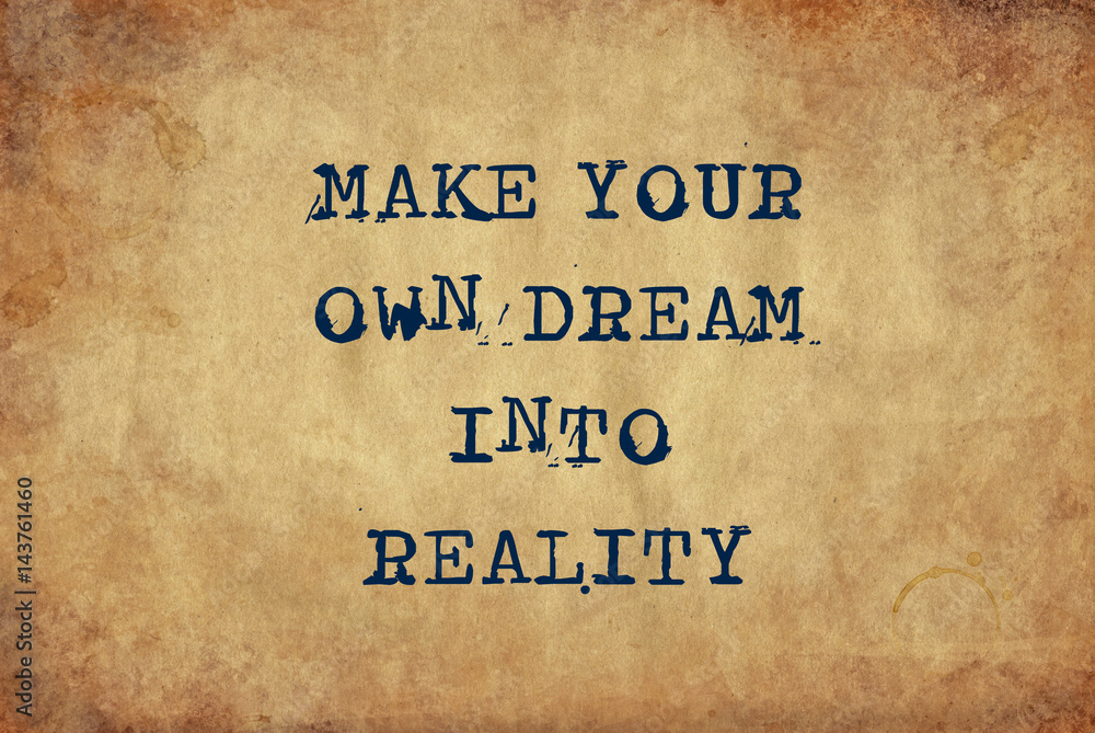 Inspiring motivation quote of make your own dream into reality with typewriter text. Distressed Old Paper with Typing image.