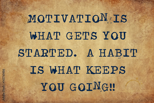 Inspiring motivation quote of motivation is what gets you started. a habit is what keeps you going. with typewriter text. Distressed Old Paper with Typing image.