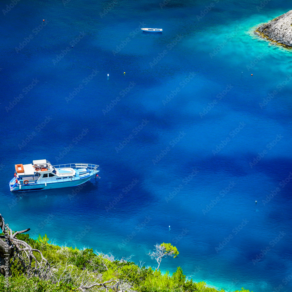Boats in the lagoon of Porto Vromi Bay. Photo from Zakynthos Island, Greece.