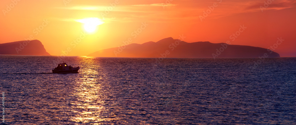 Sunrise on Aegean sea: A view on Hydra from Spetses