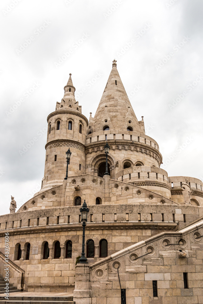 Tower of the Fisherman's bastion in Buda castle on a cloudy day, Budapest, Hungary