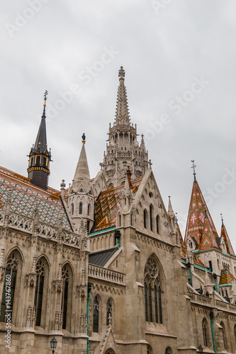 Matthias Church in Buda castle on a cloudy day in Hungary capital Budapest © aerial333