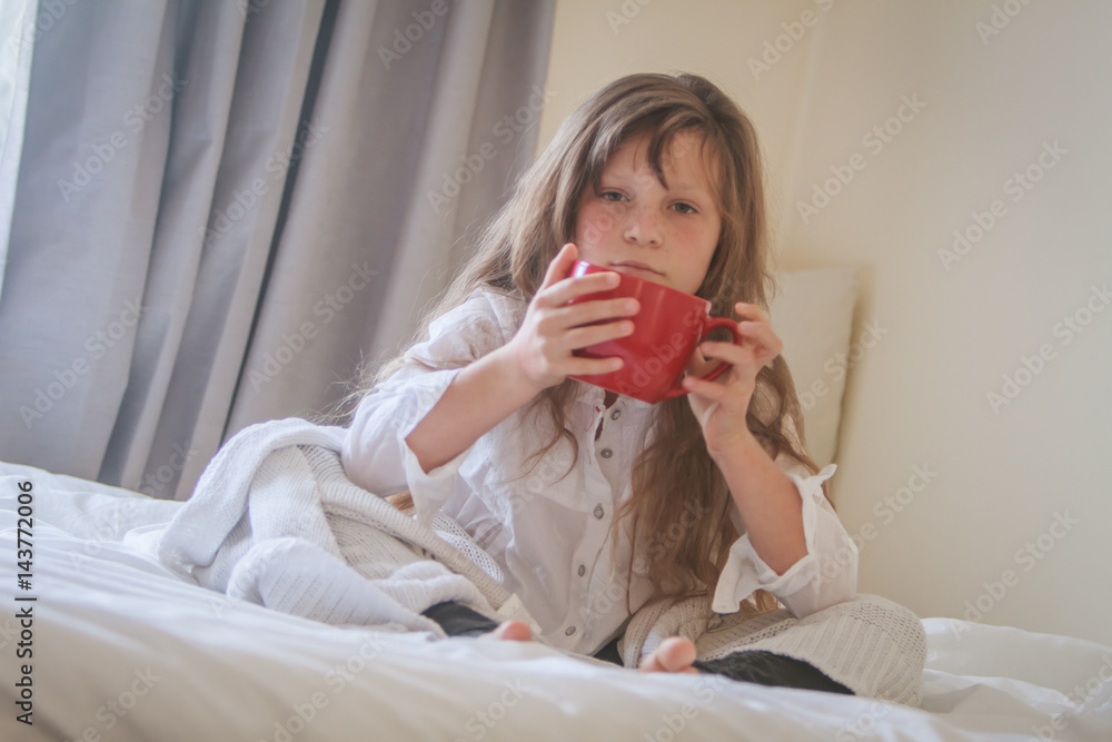 indoor portrait of young preteen girl at home