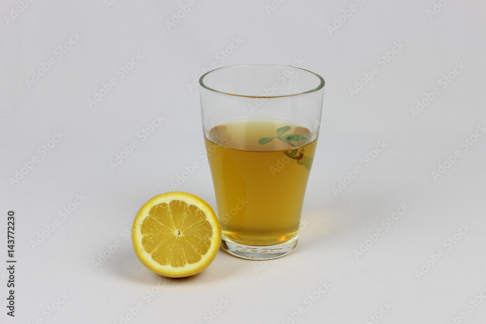 Green tea with lemon, mint and pieces of ice Green tea with lemon, mint and pieces of ice