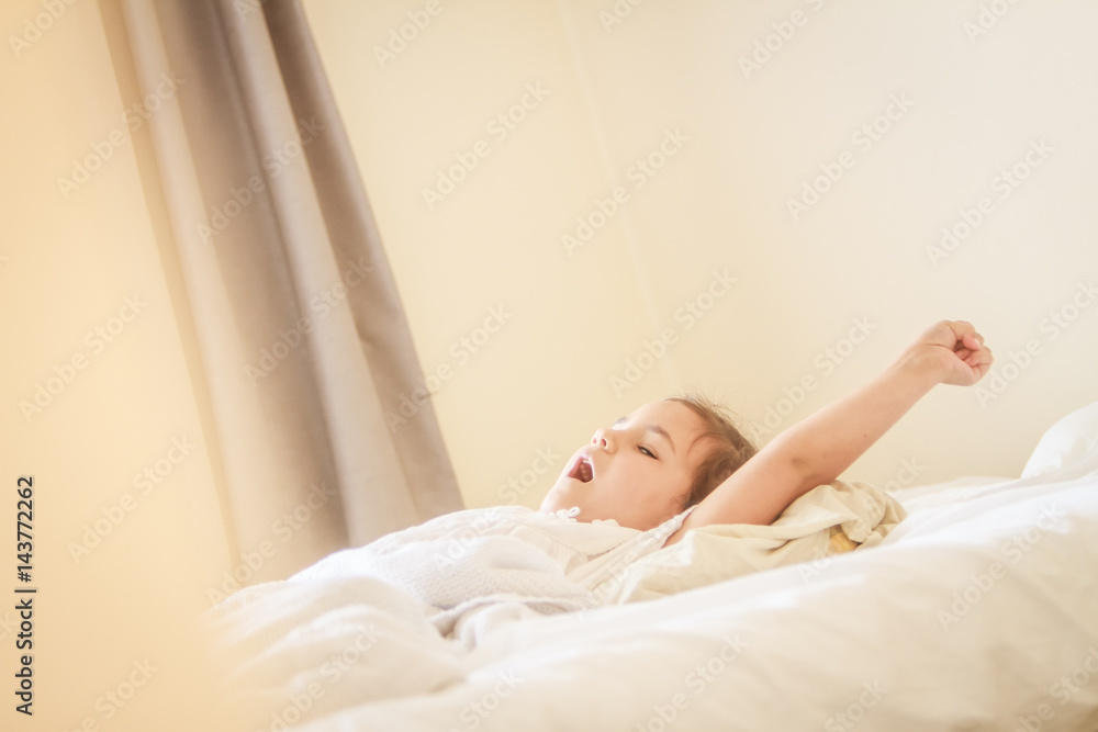 indoor portrait of young child girl wrapped in blanket indoor portrait of young child girl wrapped in blanket