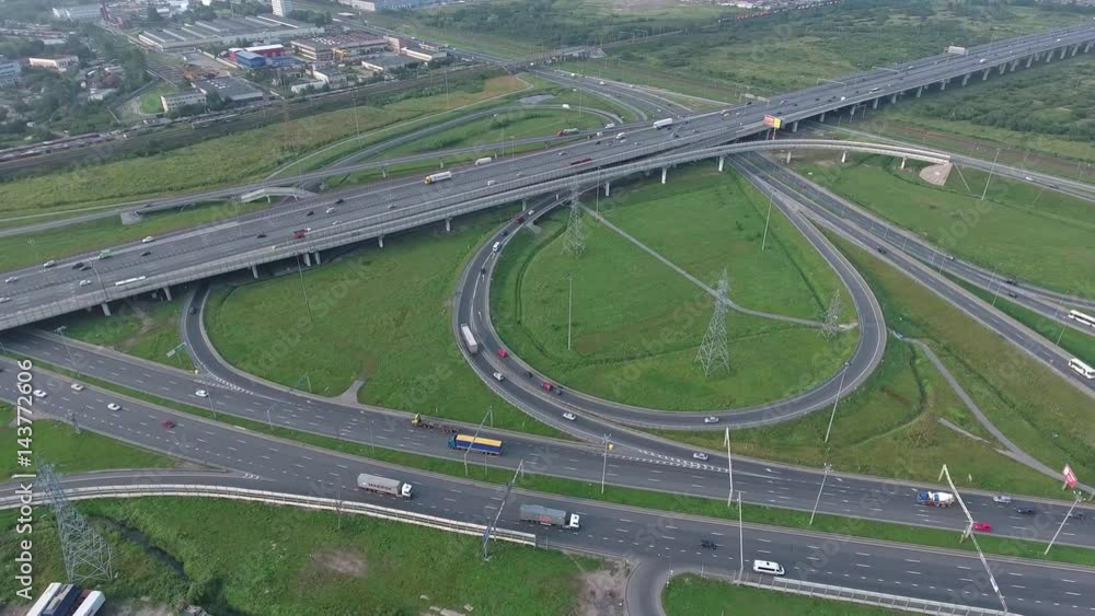 Aerial view on modern road junction, 4k
Aerial view on modern road junction, 4k