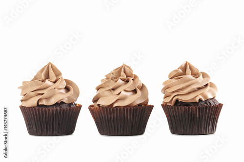 Tasty cupcakes isolated on a white