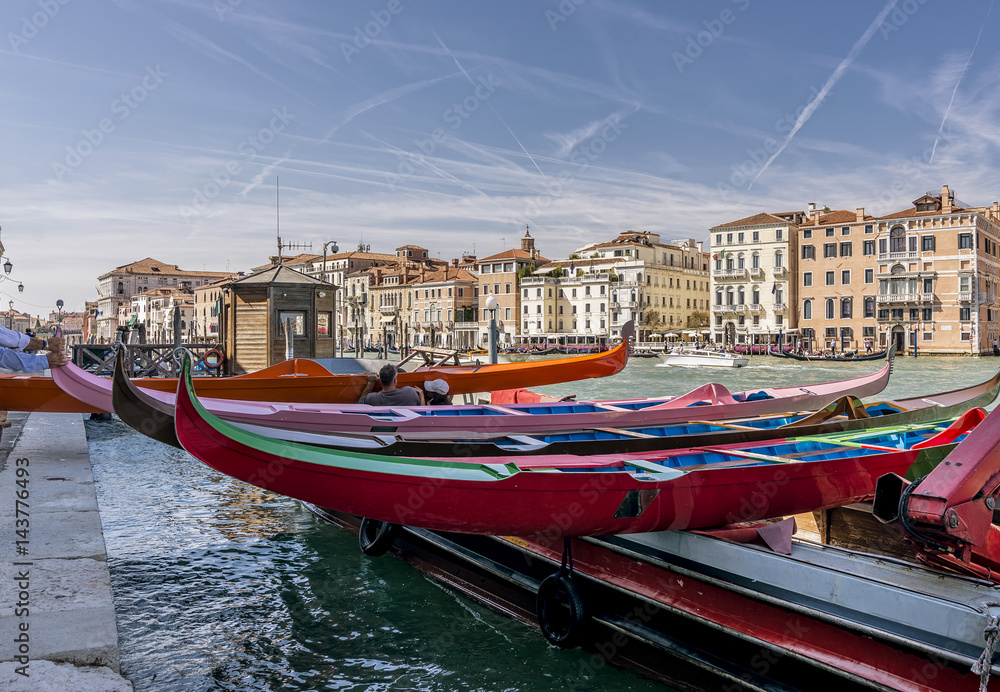 Preparation of the colorful gondolas that will participate in the historic regatta on the Grand Canal, Venice, Italy