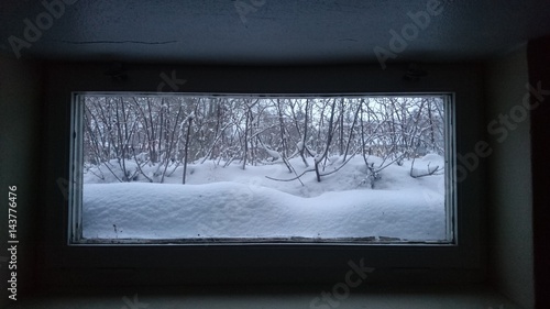 Winter outside basement window