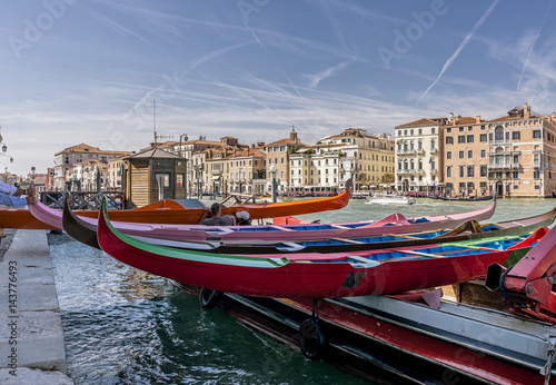 Preparation of the colorful gondolas that will participate in the historic regatta on the Grand Canal, Venice, Italy