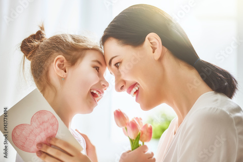 daughter congratulates mom